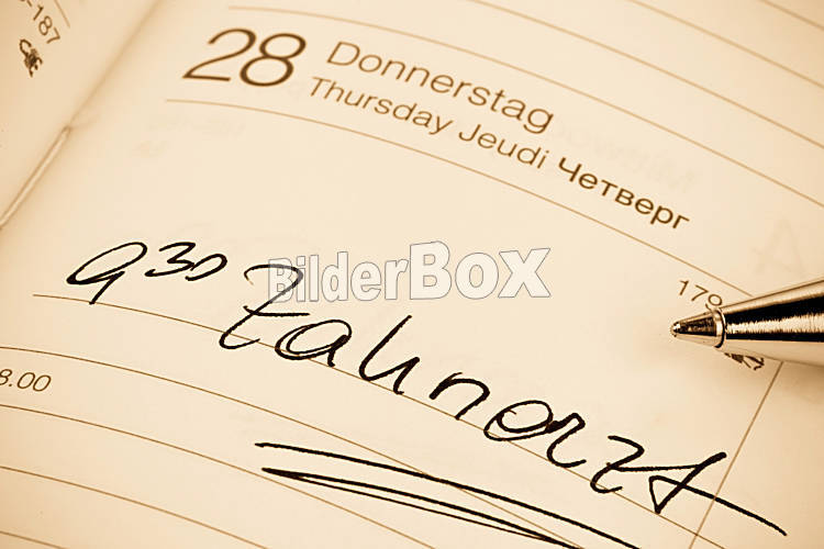 Eintrag im Kalender: Zahnarzt - Bilderbox Bildagentur GmbH